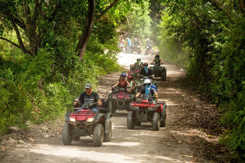 ATV tour riding a jungle trail in the mountains behind Puerto Vallarta